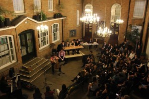 Crowd enraptured by Cello performance by Harry Lampert accompied by Becca Rickwood on the piano